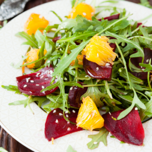 (Party Bowl) Arugula & baby greens salad, roasted beets, candied pecans, citrus (and/or seasonal fruit), vinaigrette