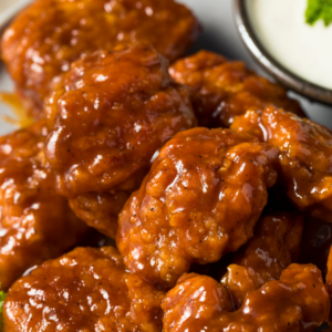 (PARTY PAN) BBQ "Poppers"- pargit popcorn chicken in a sticky-sweet & smoky BBQ sauce (GLUTEN)